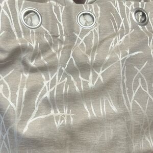 Light beige grommet curtain panels (4)